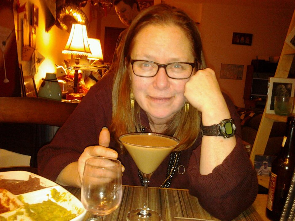 Carol with a yummy eggnog martini! Carol with a yummy eggnog martini!